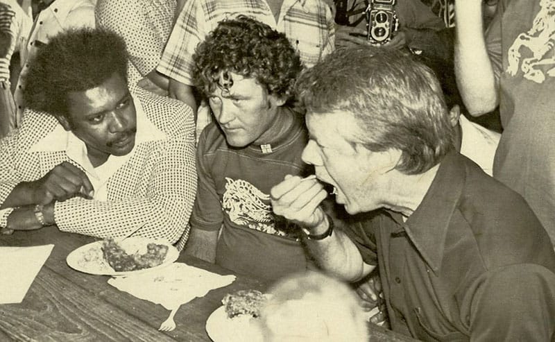 Don King with Capricorn Records co-founder Phil Walden and future-president Jimmy Carter at a picnic in 1976