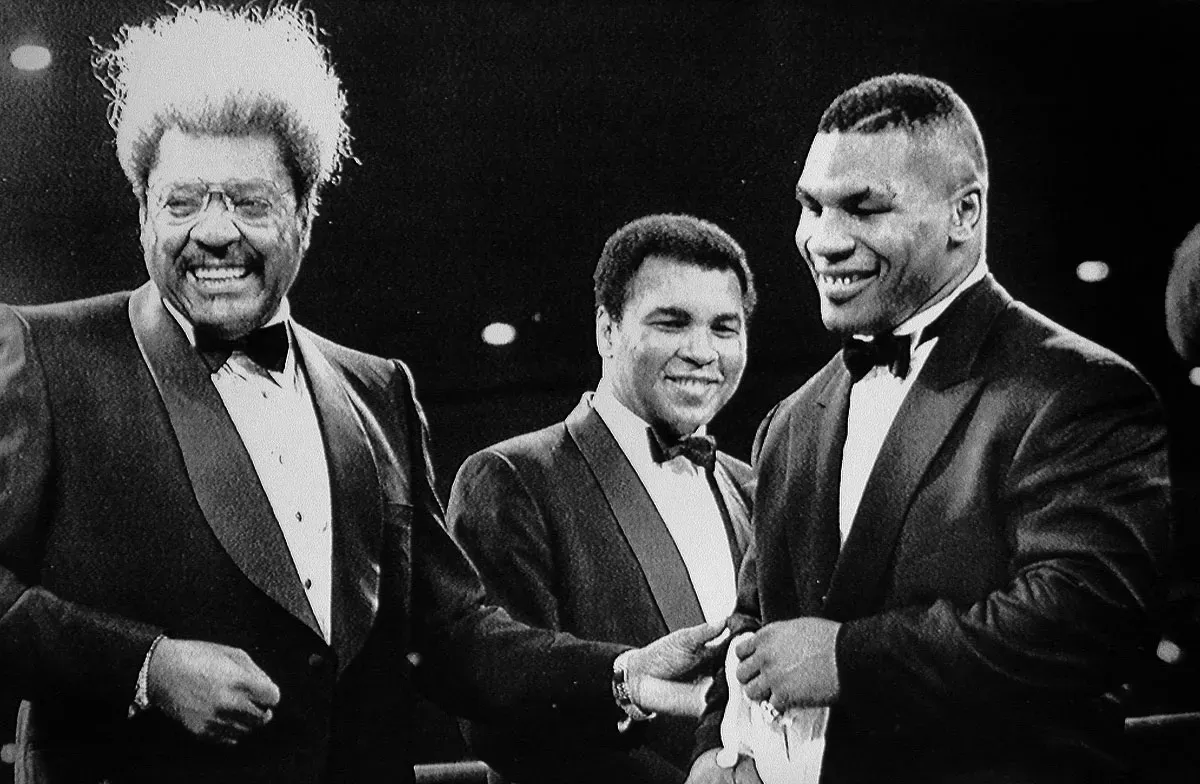 Don King, Muhammad Ali, and Mike Tyson sharing a laugh