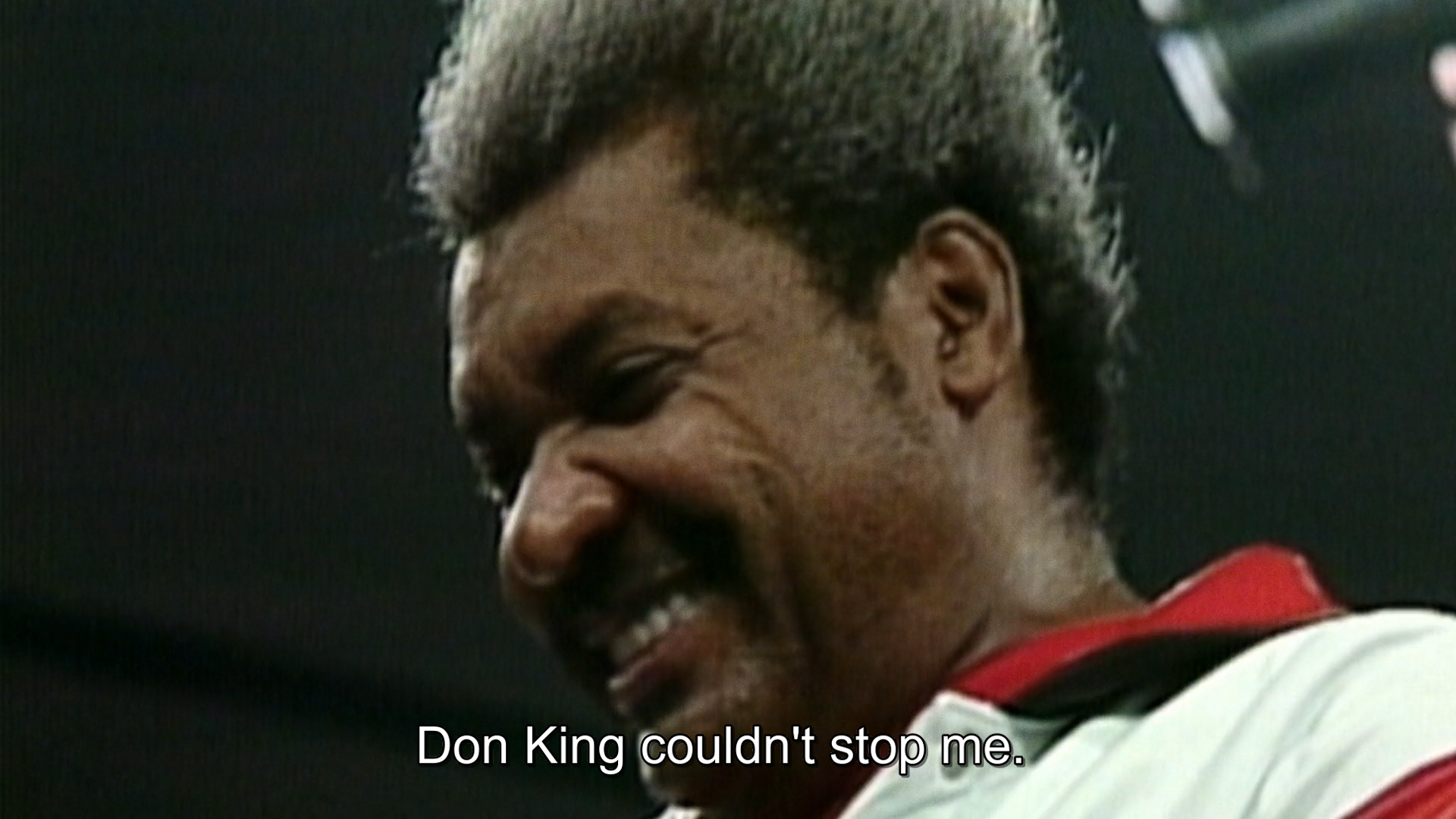 A screenshot of Don King smiling, the subtitles say "Don King couldn't stop me."